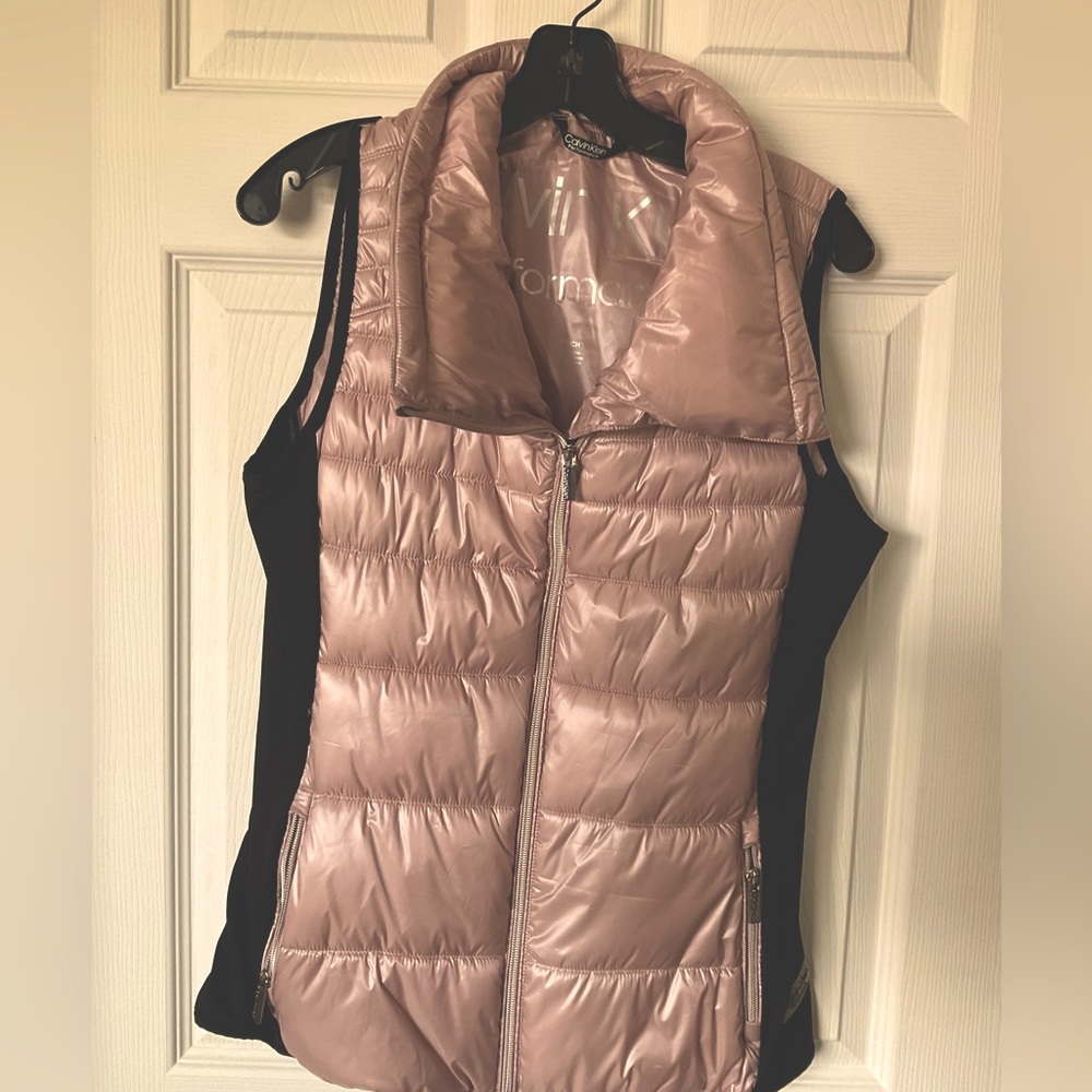 - Calvin Klein pink and black puffer vest NWOT. Size Small